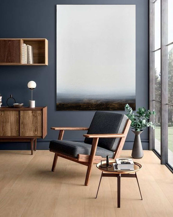 Absent, white original abstract painting shown in a styled living room, by Nemanja Nikolic