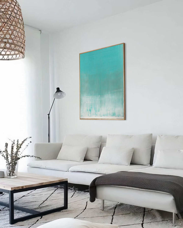 Caught in the Moment, turquoise original abstract painting shown in a styled living room, by Nemanja Nikolic