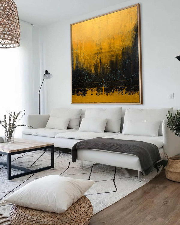 End of Beginning, gold original abstract painting shown in a styled living room, by Nemanja Nikolic