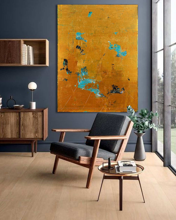 Eternal Duality, gold original abstract painting shown in a styled living room, by Nemanja Nikolic