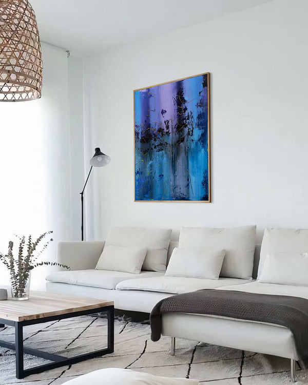 Frequency, blue original abstract painting shown in a styled living room, by Nemanja Nikolic