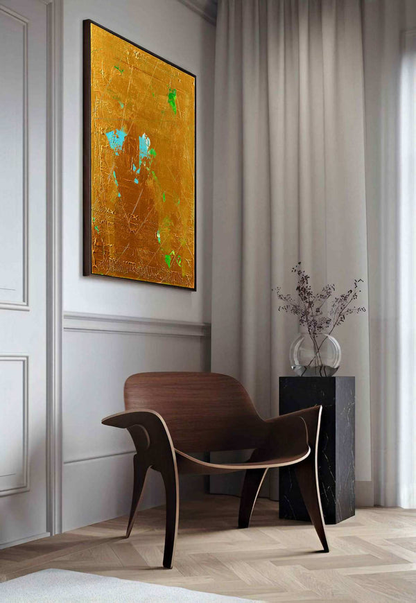Over You, gold original abstract painting shown in a styled living room, by Nemanja Nikolic