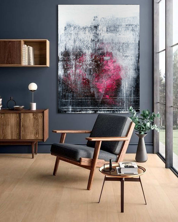 Split Second, black original abstract painting shown in a styled living room, by Nemanja Nikolic