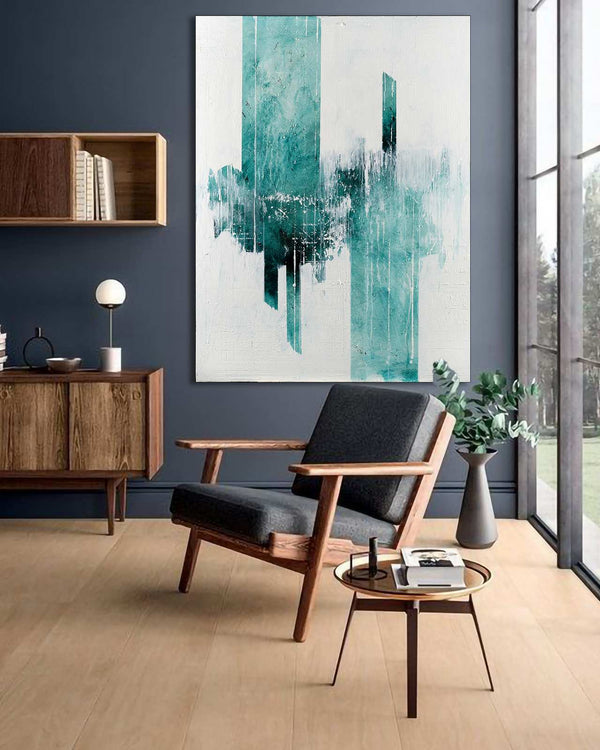 The Iceberg, teal original abstract painting shown in a styled living room, by Nemanja Nikolic