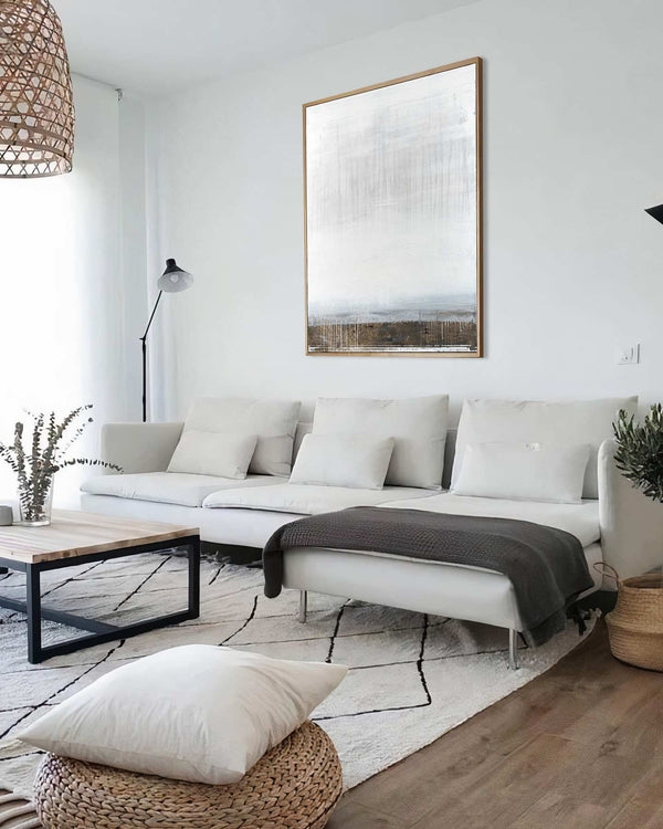 Ancient Sky, white original abstract painting shown in a styled living room, by Nemanja Nikolic
