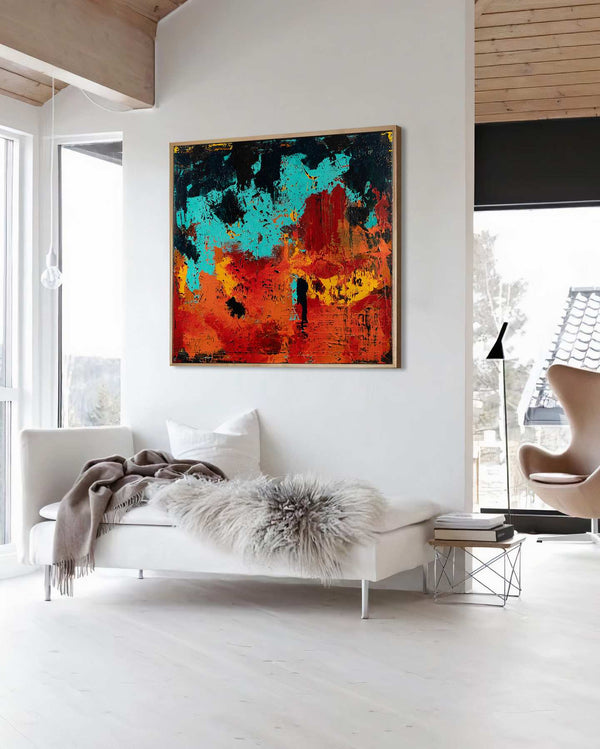 Burning Sky at Night, orange original abstract painting shown in a styled living room, by Nemanja Nikolic