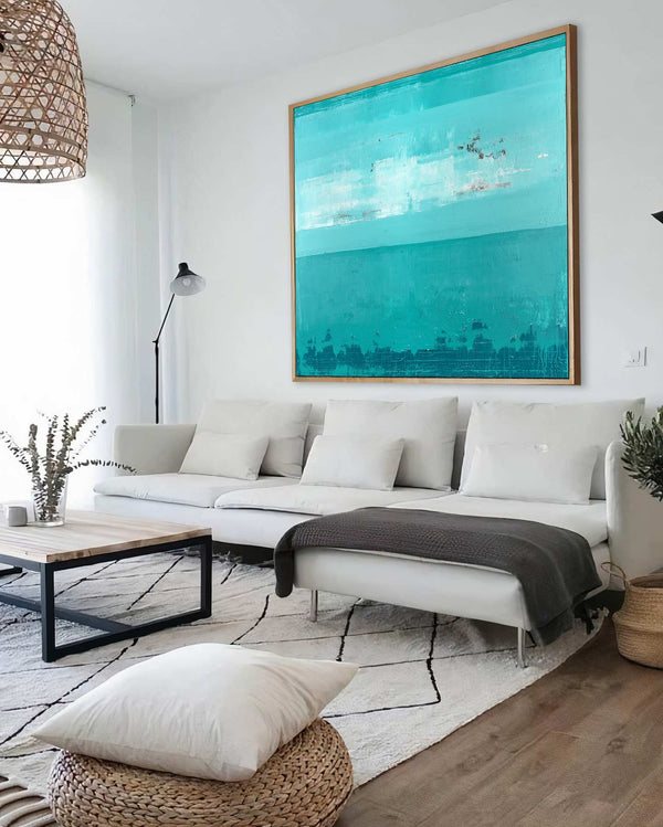 Tepre Pacificum, turquoise original abstract painting shown in a styled living room, by Nemanja Nikolic