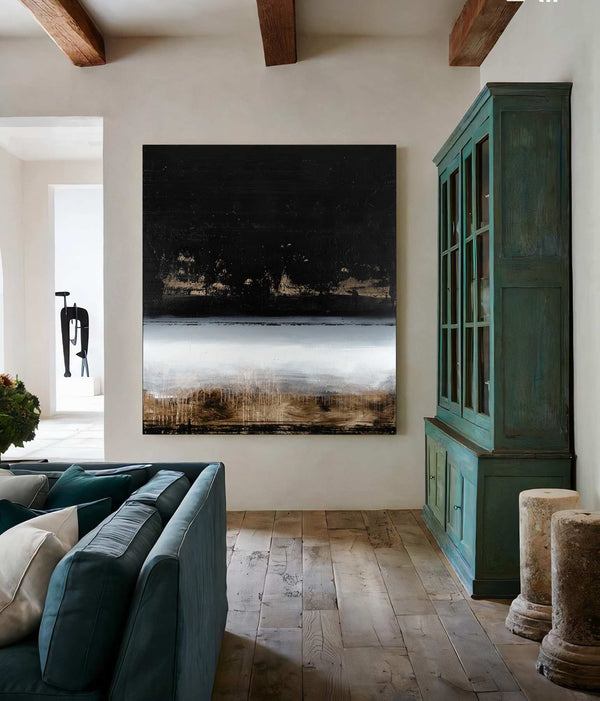 Darker Than the Moon, black original abstract painting shown in a styled living room, by Nemanja Nikolic