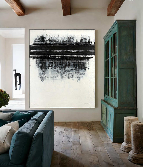 Driving by the forest, black original abstract painting shown in a styled living room, by Nemanja Nikolic