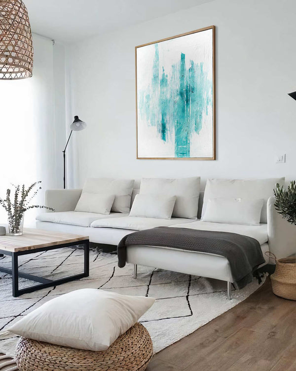 Essence In Us, turquoise original abstract painting shown in a styled living room, by Nemanja Nikolic