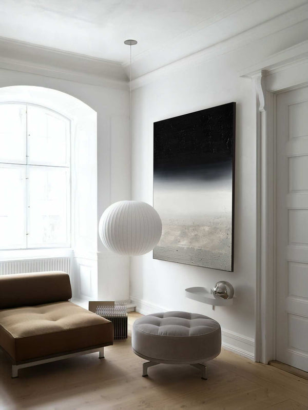 From Above, black original abstract painting shown in a styled living room, by Nemanja Nikolic