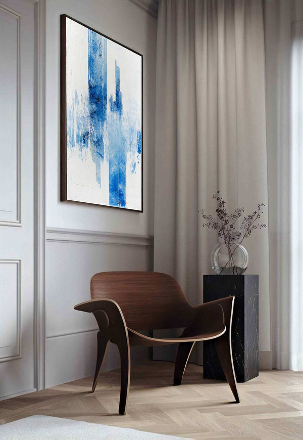 Glacies Caeruleo, white original abstract painting shown in a styled living room, by Nemanja Nikolic
