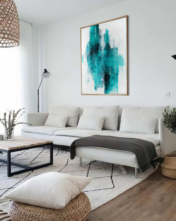 Icelandic, teal original abstract painting shown in a styled living room, by Nemanja Nikolic