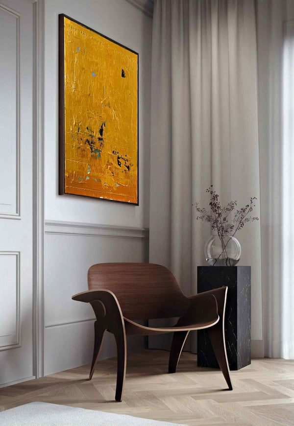 Innocentia, gold original abstract painting shown in a styled living room, by Nemanja Nikolic