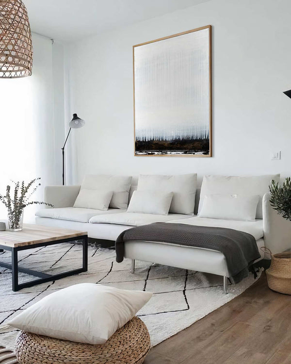In the Silence, white original abstract painting shown in a styled living room, by Nemanja Nikolic