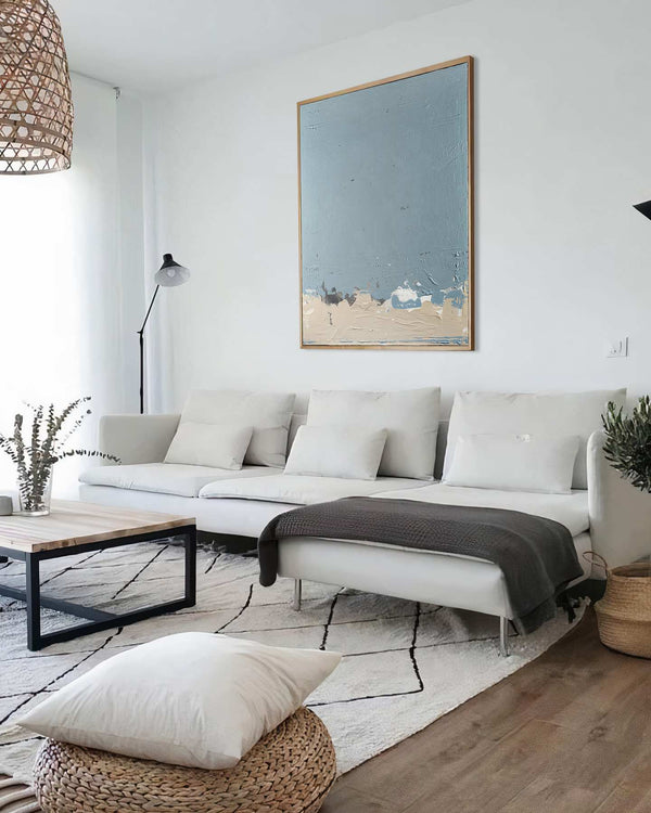 Look Up to the Skies, grey original abstract painting shown in a styled living room, by Nemanja Nikolic