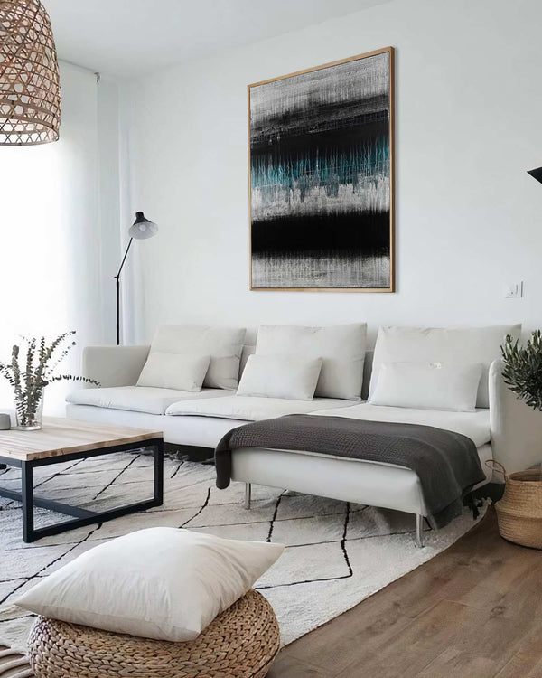Outvoice, black original abstract painting shown in a styled living room, by Nemanja Nikolic
