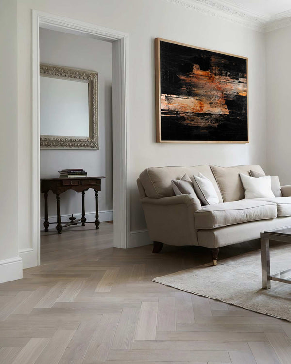 Pyrogenic, black original abstract painting shown in a styled living room, by Nemanja Nikolic