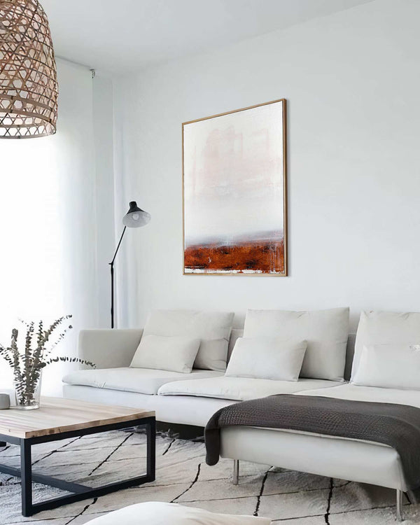 The Sacred Land, white original abstract painting shown in a styled living room, by Nemanja Nikolic