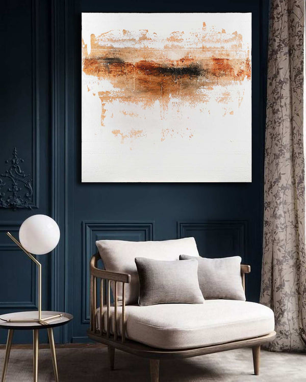The Sands on the Horizon, white original abstract painting shown in a styled living room, by Nemanja Nikolic