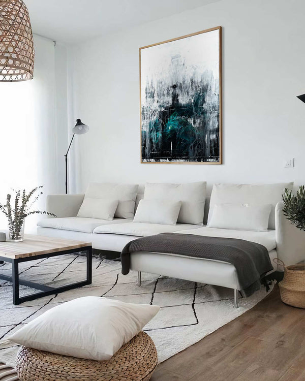 Washed in black, white original abstract painting shown in a styled living room, by Nemanja Nikolic