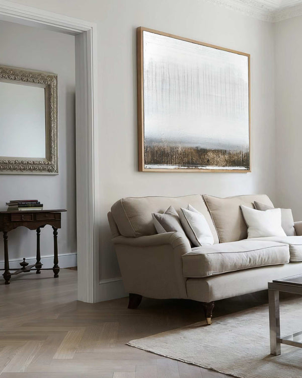 Winter's Eve, white original abstract painting shown in a styled living room, by Nemanja Nikolic