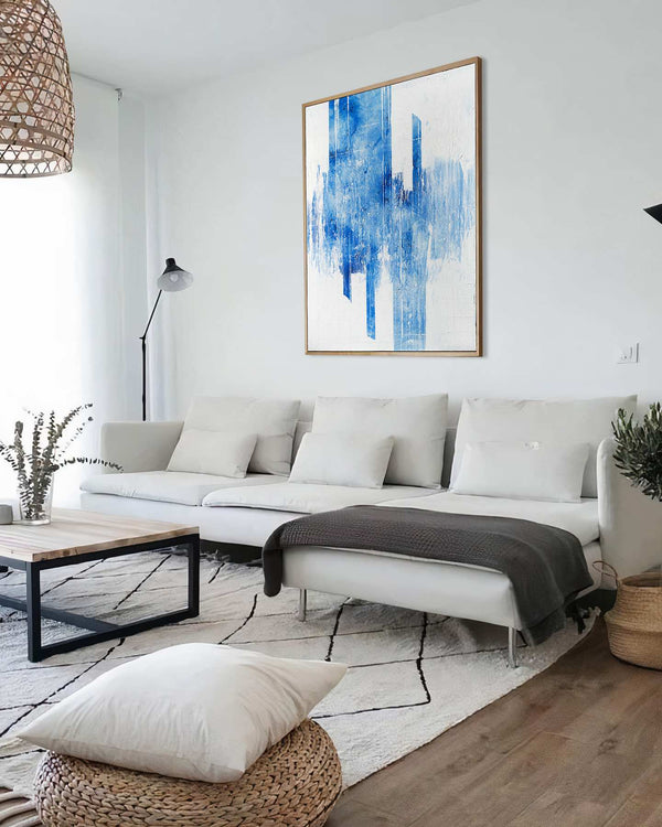 Worth Fighting For, blue original abstract painting shown in a styled living room, by Nemanja Nikolic